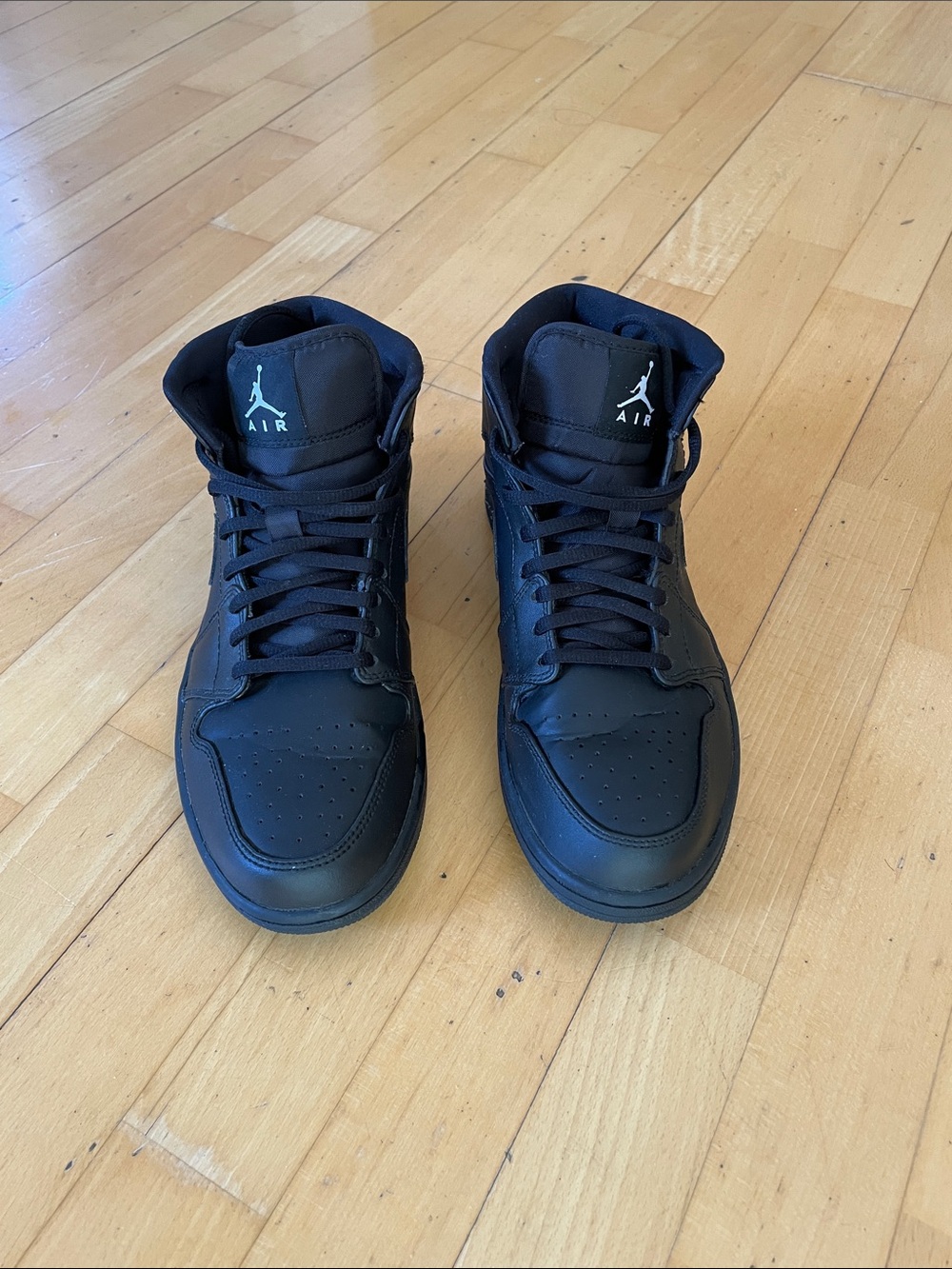 Nike Air Jordan 1 Mid Retro Black Sneakers
